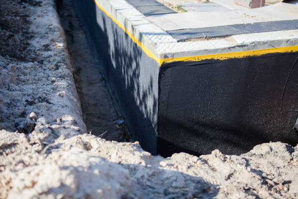 Professional Waterproofing technician working in Takoma Park, MD